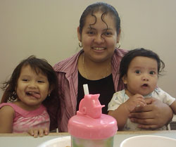 A Baby College participant and her two children enjoy the class.