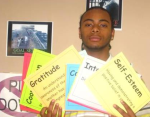 A youth recognized for displaying all 15 character traits as part of the Evidenced Based Aggression Replacement Training Program (photo from the Tennessee Department of Children Services Web Site)