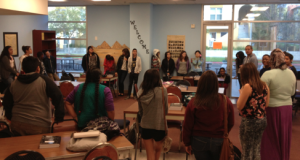 In this classroom circle students stand to accommodate to the room.