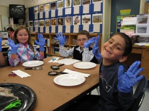 Students pose during "Squid Dissection Day" at Two Rock Elementary School, where Mike Simpson is currently superintendent and principal